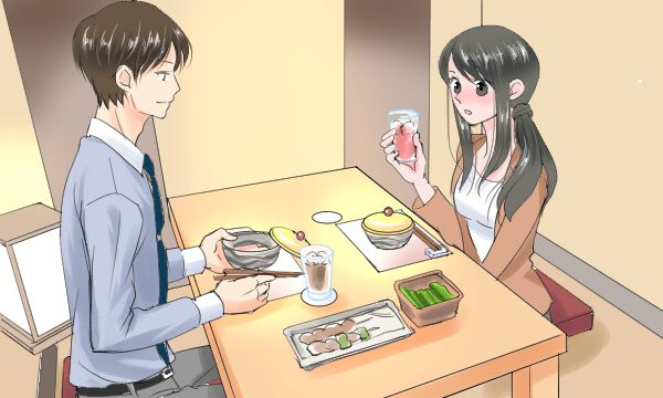 静かな和食居酒屋で食事する男女