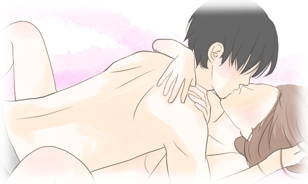 カラダを重ねてキスする男女