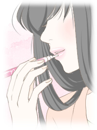 リップグロスを唇に塗る女性