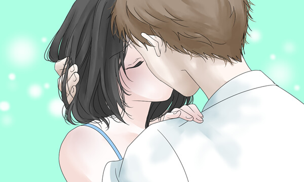 男性が強引に女性にキスをする