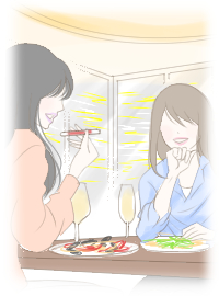 楽しそうに食事する女性二人